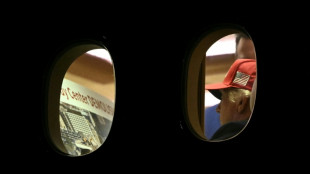 AFP photo shows Trump examining image of apparent Kennedy Center razing