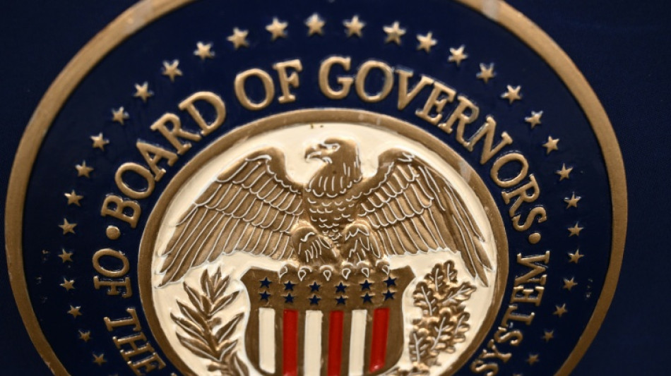 Gold hits record, stocks diverge as Trump fuels Fed fears