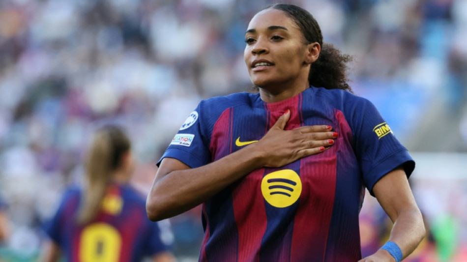Spain striker Paralluelo joins Lyon from Barcelona