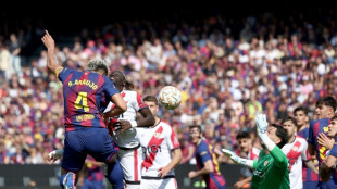 Araujo header scrapes Liga leaders Barca win over Rayo