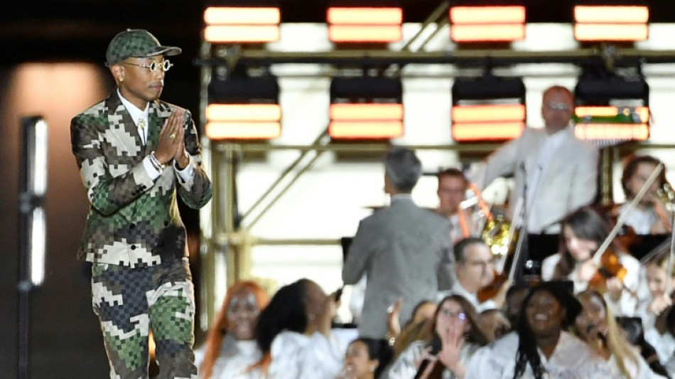 Esth&eacute;tique militaire et damier pour la premi&egrave;re de Pharrell Williams pour Vuitton