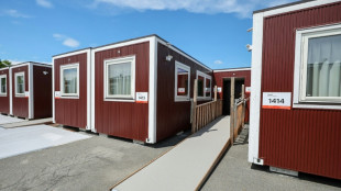 IOC president impressed by 'beautiful' Asian Games wooden huts
