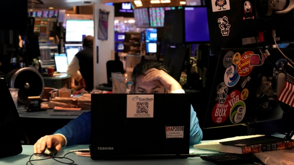 Wall Street finit en baisse, inqui&egrave;te de la trajectoire de la Fed