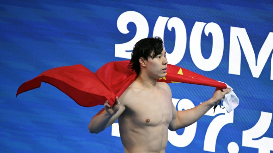 China's Qin milks 'miracle' second breaststroke gold at swim worlds