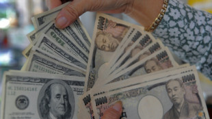 Dollar sinks on yen intervention talk, gold breaks $5,100