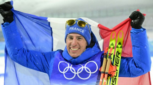 JO-2022: Quentin Fillon Maillet porte-drapeau fran&ccedil;ais &agrave; la c&eacute;r&eacute;monie de cl&ocirc;ture