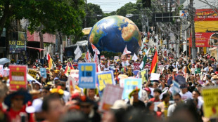 Massive march in Brazil marks first big UN climate protest in years