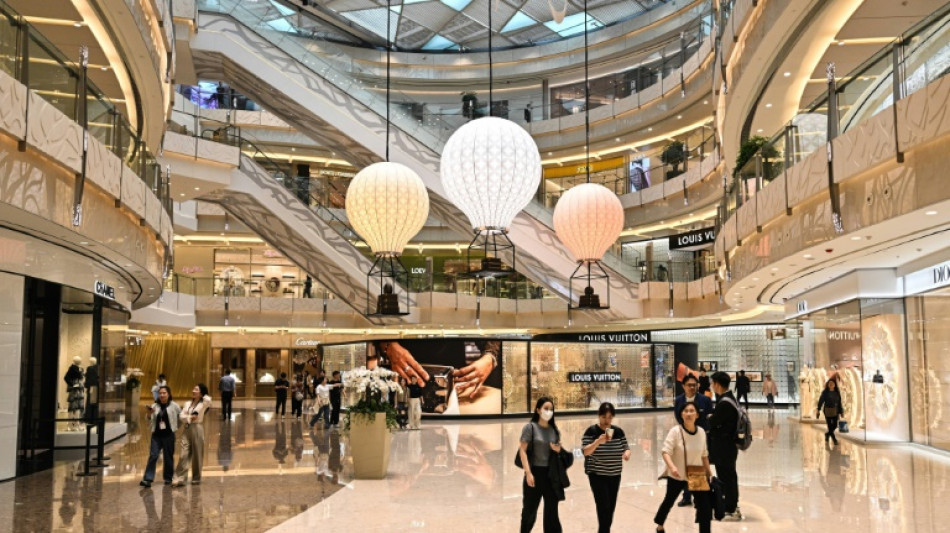 Beijing consumers mull spending habits as 'worrying' tariffs kick in