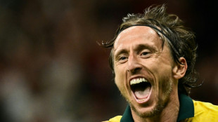 Timeless Modric opens AC Milan account with winner against Bologna