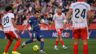 Atletico go third with comfortable win at Girona