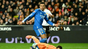 Real Madrid edge Valencia to stay on Barca's tail, Atletico slump