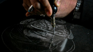 Engraved tombs help keep memories alive in Pakistan