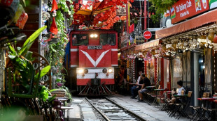 Tourists dice with danger on Hanoi's train street