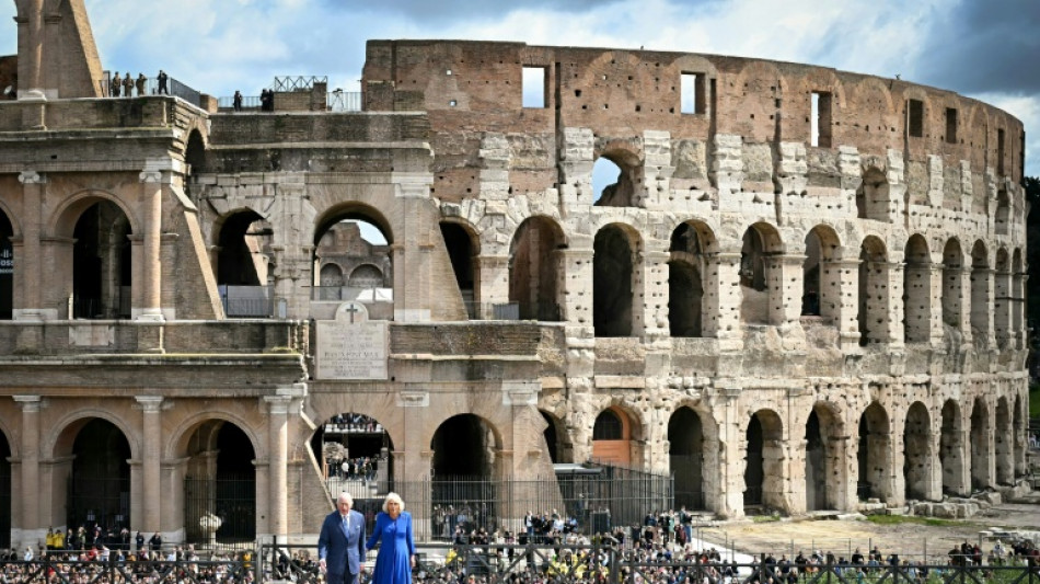 Charles and Camilla pose at Colosseum in pomp-filled Italy visit