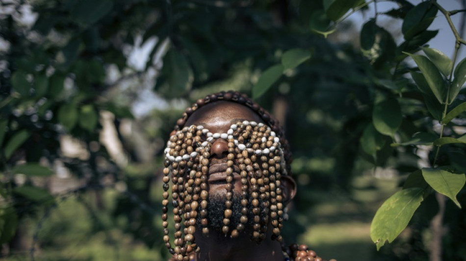 Les dandys "sapeurs" font leur show &agrave; Kinshasa