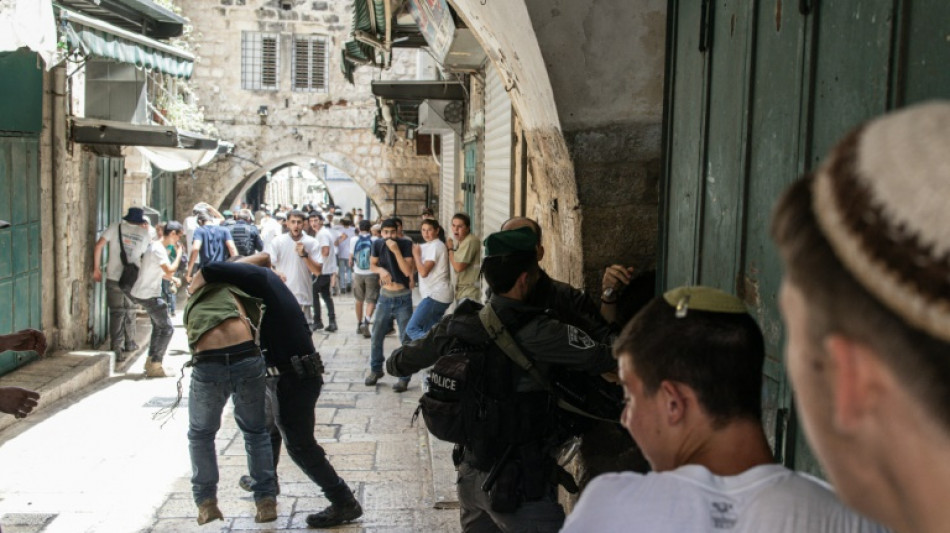 Scuffles, insults as Israelis celebrate Jerusalem Day under shadow of Gaza war