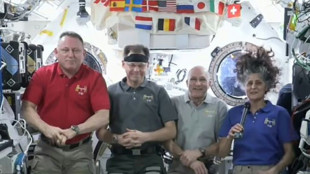 "C'est un bonheur d'&ecirc;tre ici", rassurent les deux astronautes am&eacute;ricains coinc&eacute;s dans l'ISS
