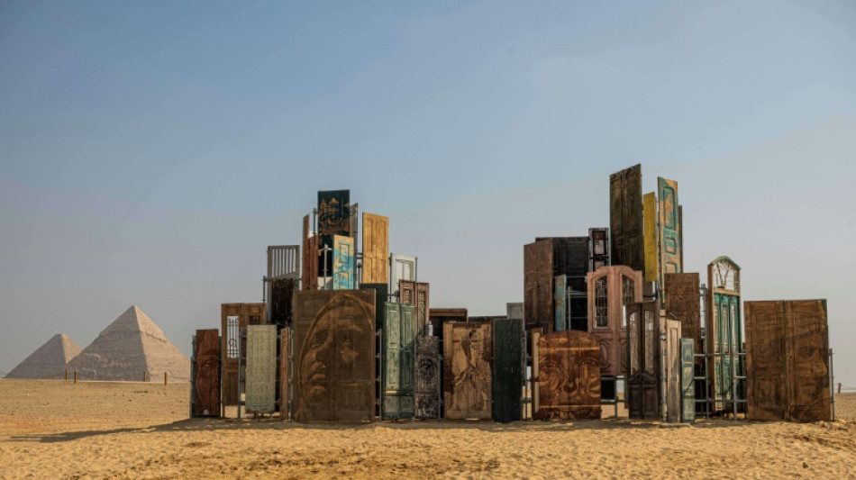 Monumental art displayed in shade of Egypt's pyramids 